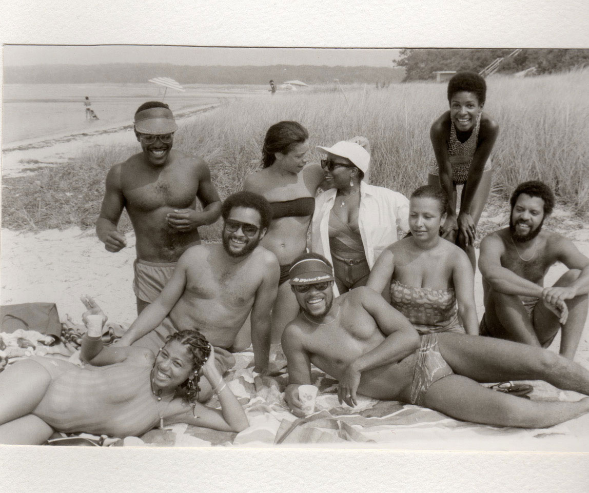 A group relaxing on a beach