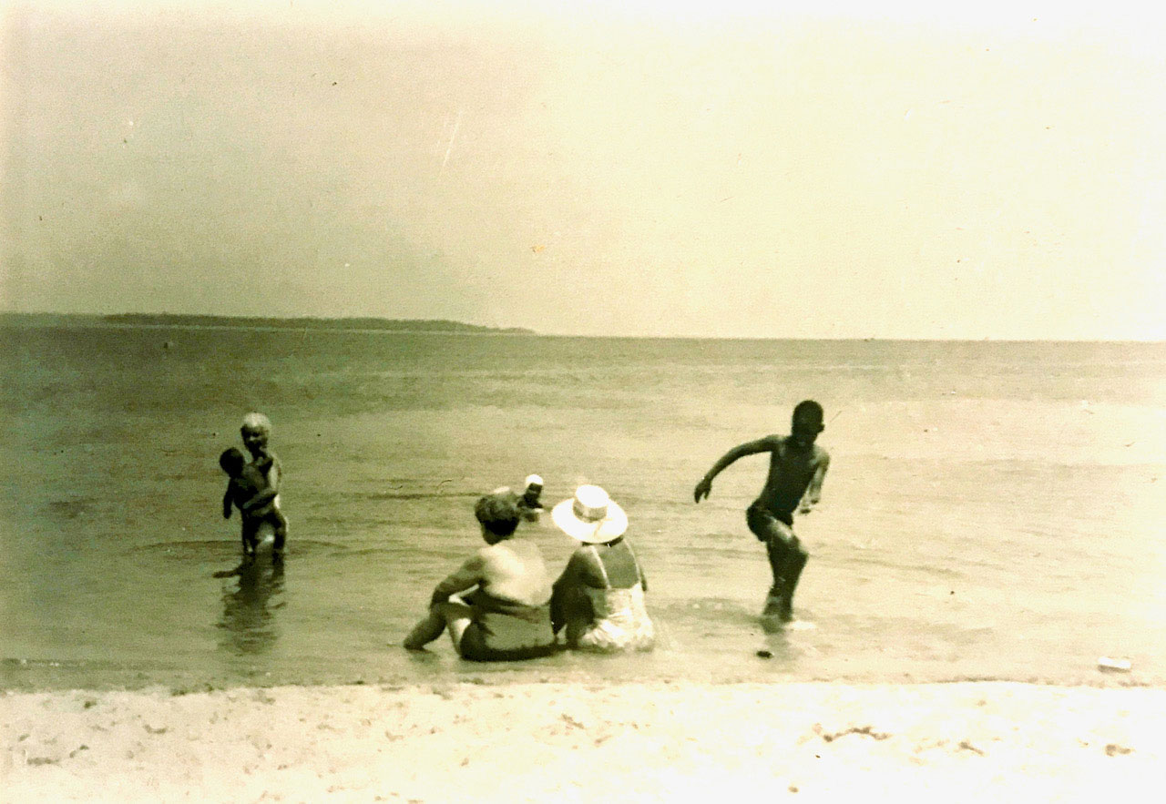 Children playing in the ocean