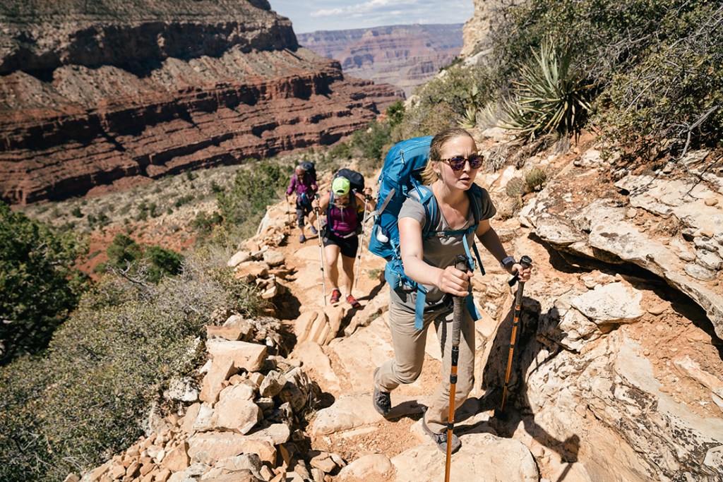 Hikers ascend a trail in Grand Canyon National Park.