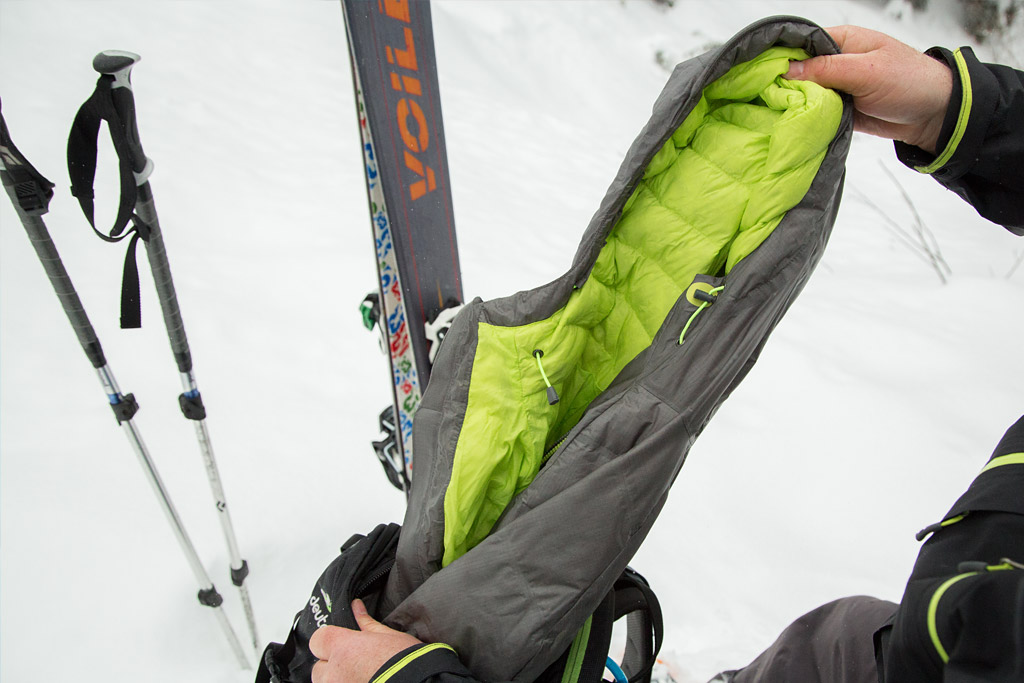 keep the puffy on top of your bag when in the backcountry for rest stops and transitions