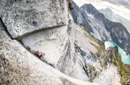 woman climbs an alpine rock climbing route in the Enchantments