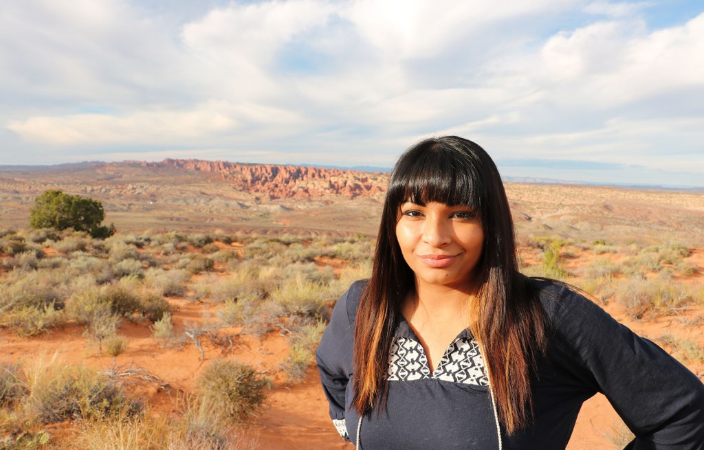 Ambreen in front of open plains