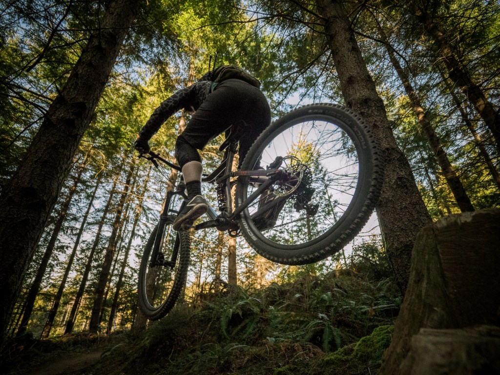 mountain biker using clipless pedals