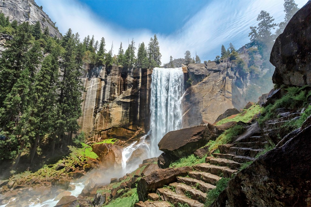 Yosemite's Vernal Falls—on the popular Mist Trail—covers granite in spray.