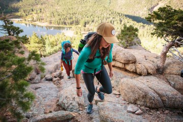 two women on an uphill trail