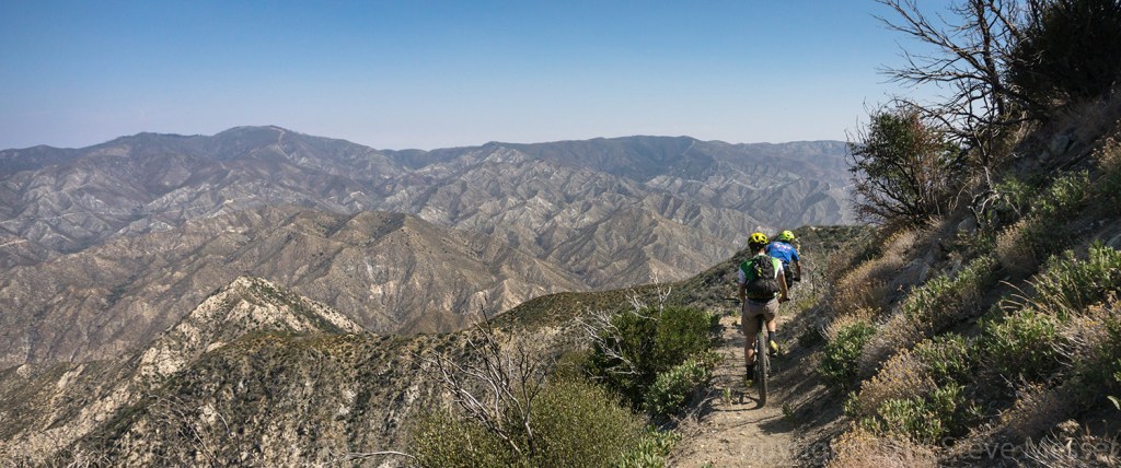 Two riders enjoy the views near Strawberry Peak in the San Gabriel Mountain National Monument.