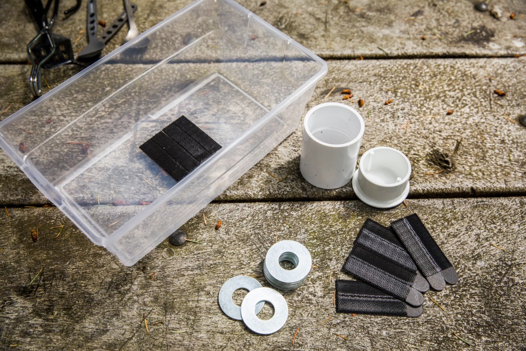 Plastic bin with adhesive hook-and-loop tape