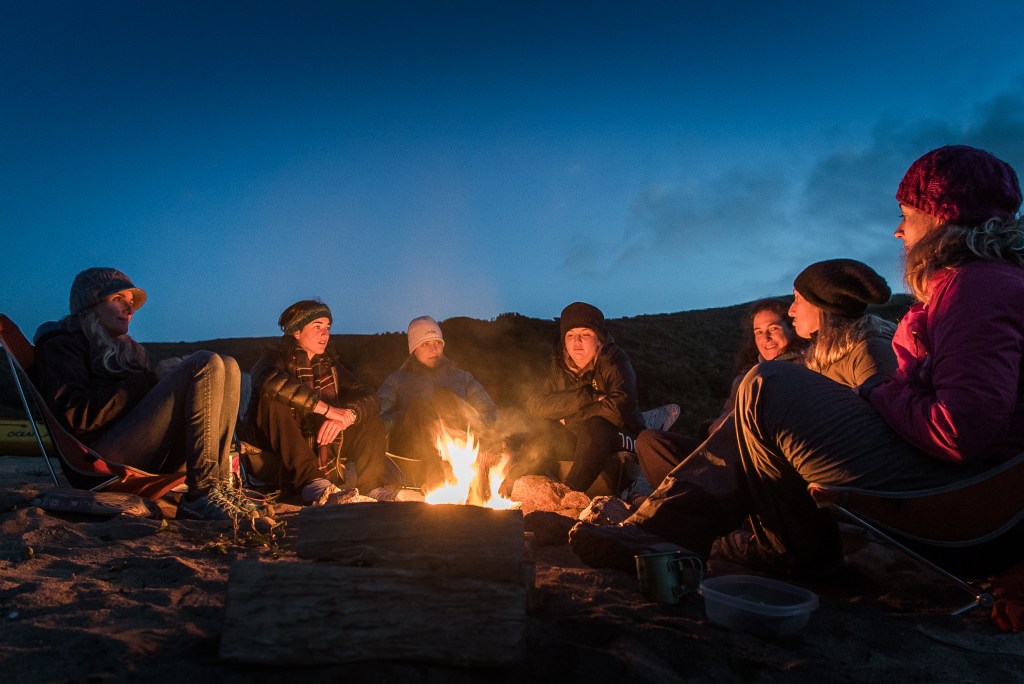 Trail Mavens around the campfire
