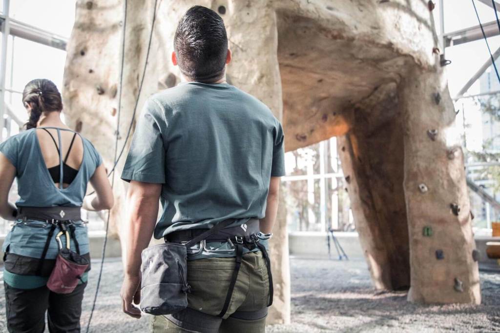 Climbers gazing at the wall in the gym