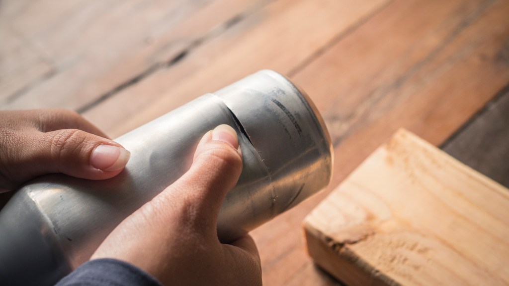 prep the cans for a DIY Alcohol Stove