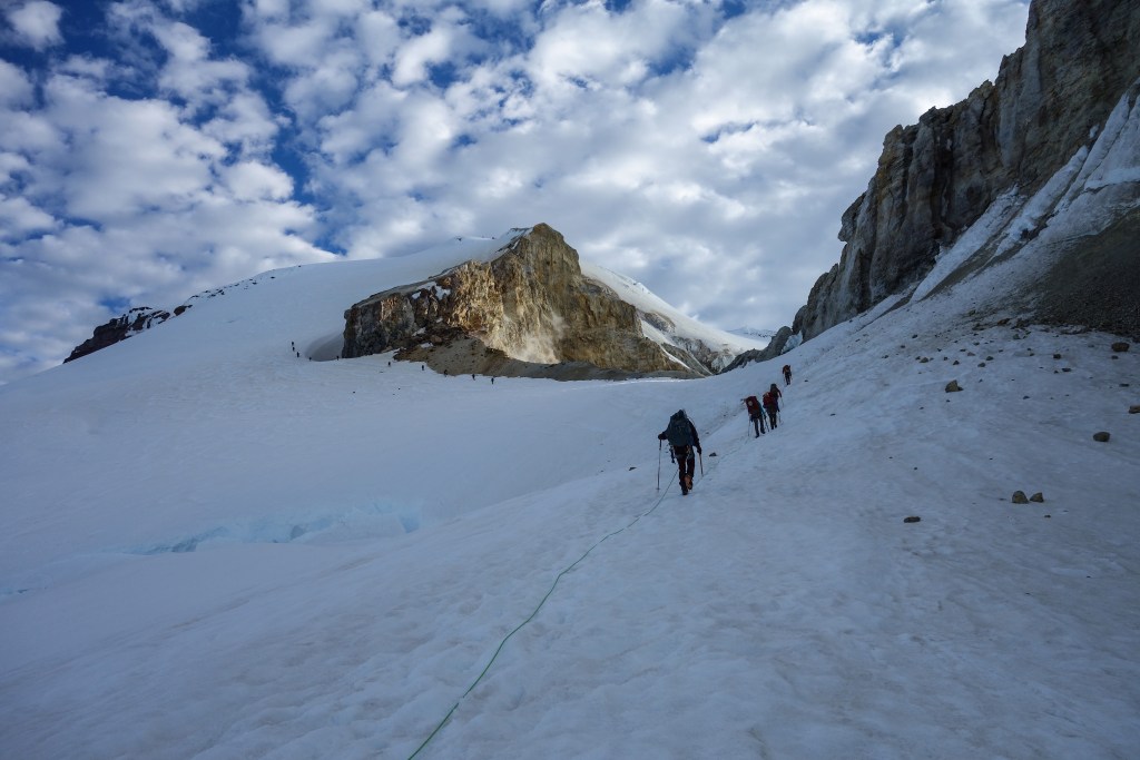 climbers approach crater