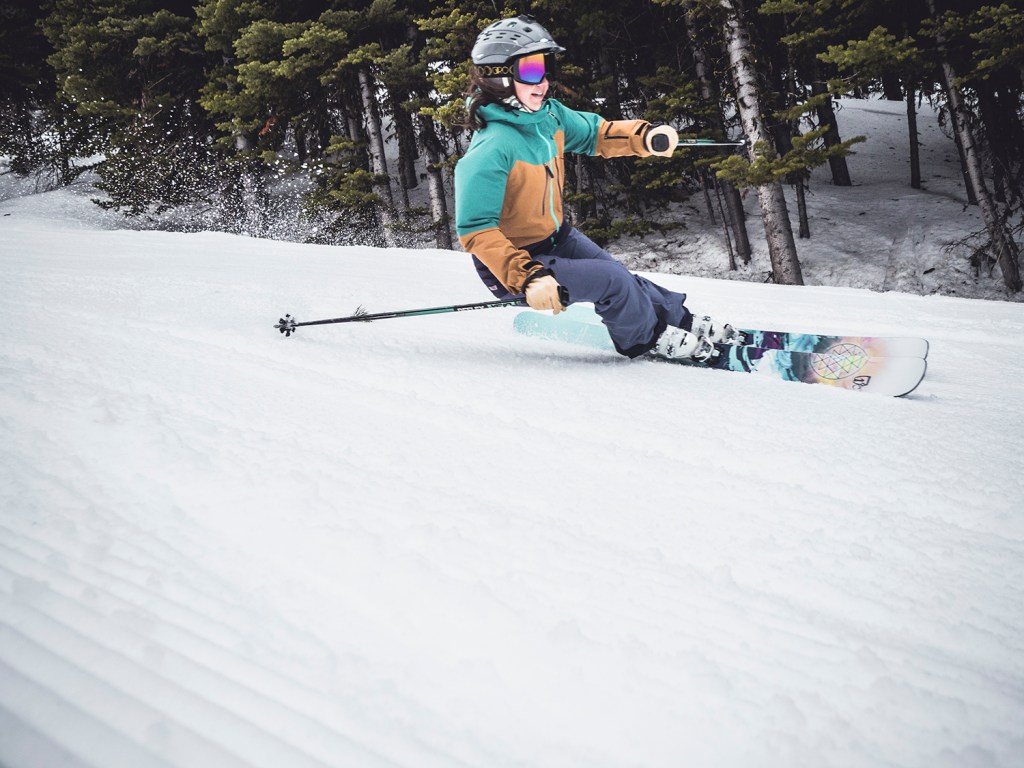 Skier on the Icelantic Maiden 101 Skis