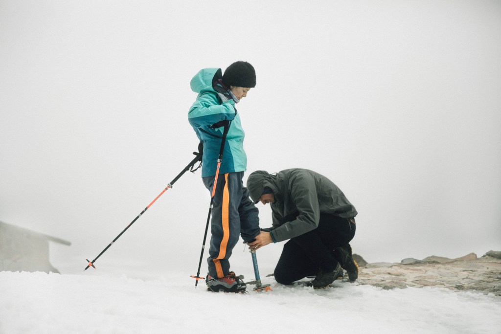 Adjusting Kathy's crampon prosthetic attachment