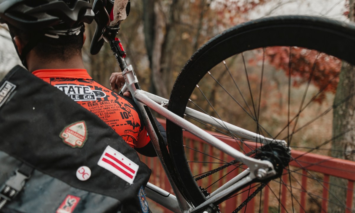 Dustin carrying bike
