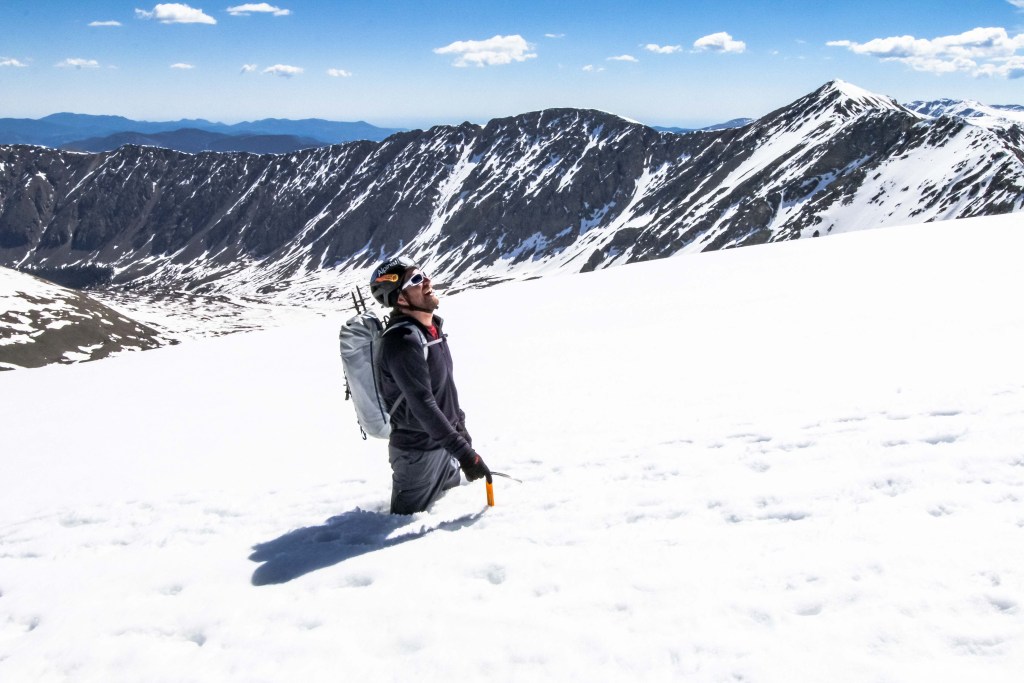 Hiker who has postholed in the snow