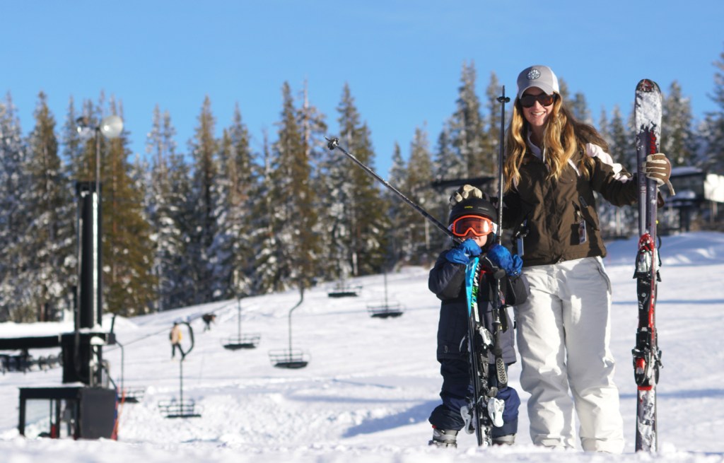Anna and her son skiing