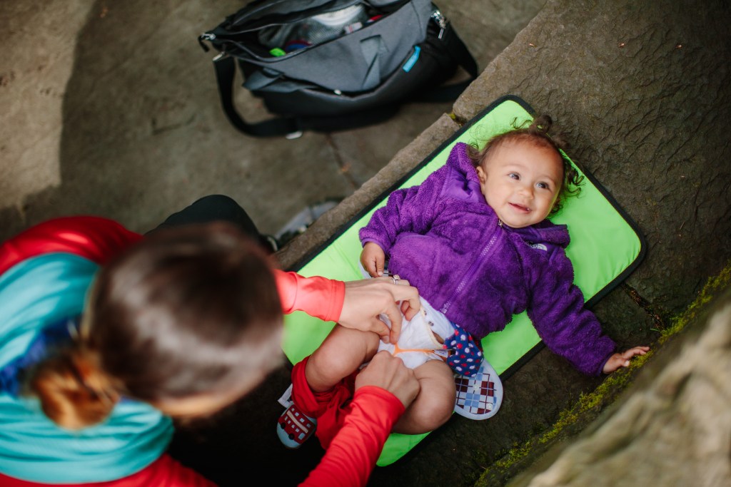 Changing diaper on trail