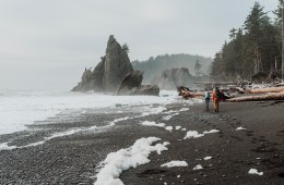 hikers on a beach
