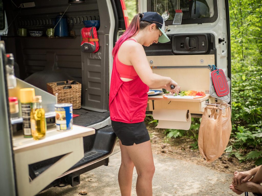 Prepping dinner in the van kitchen