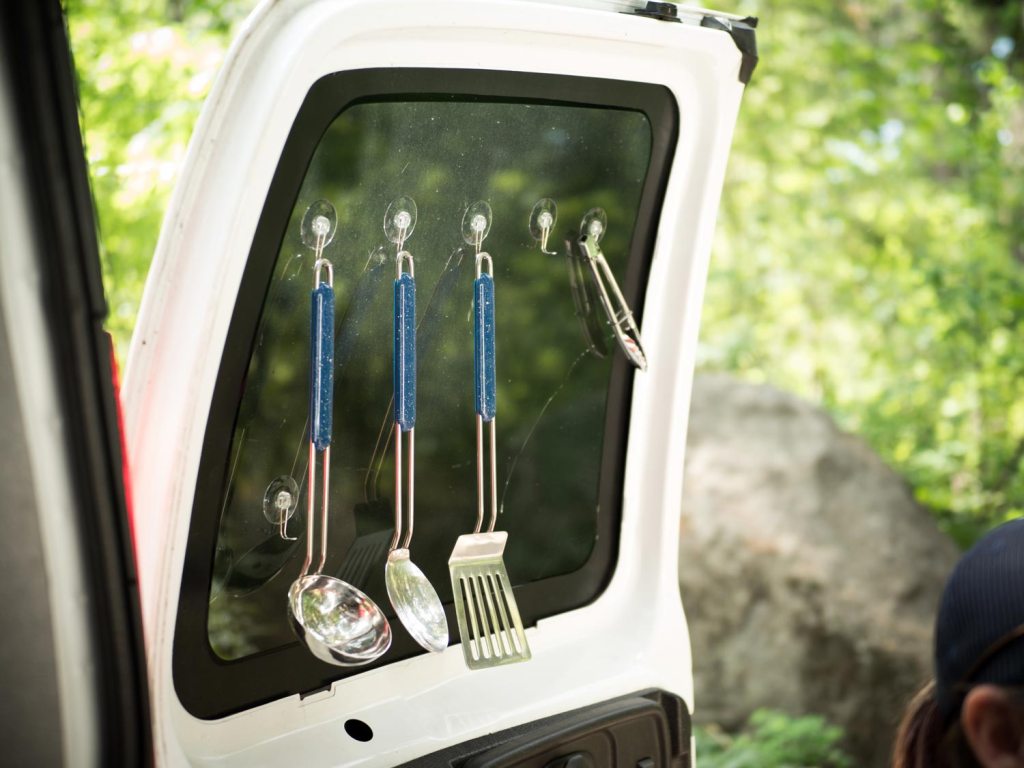 Utensils hanging from the van door