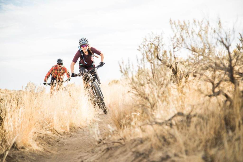 Mountain bike riders ripping on the trails.