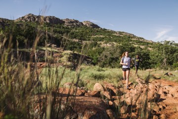 Two friends trail running