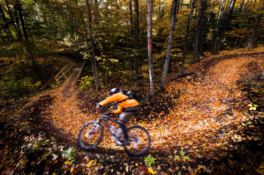 Mountain biking in fall on the South Trails of Marquette Michigan. 