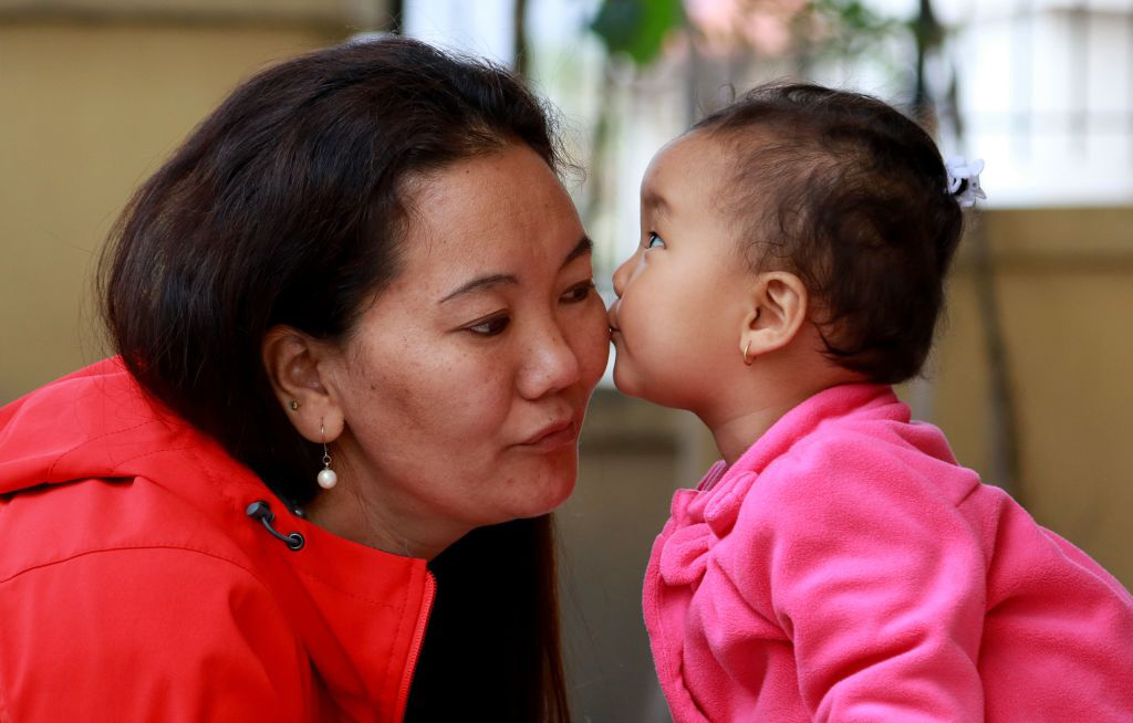 In this photograph taken on April 18, 2018, Nepali climber Lhakpa Sherpa bids farewell to her niece as she prepares to leave for an expedition to Everest, in the Nepali capital Kathmandu.