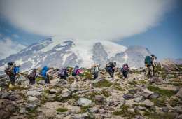 Hikers on a snowcapped volcano