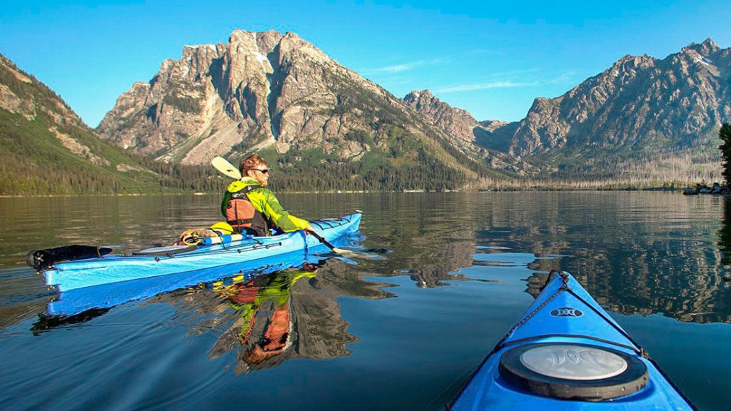 Kayakers take in Mount Moran.