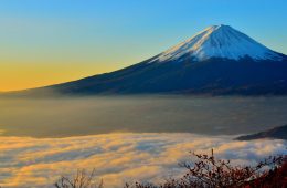 Mount Fuji reflects the glow of sunrise.