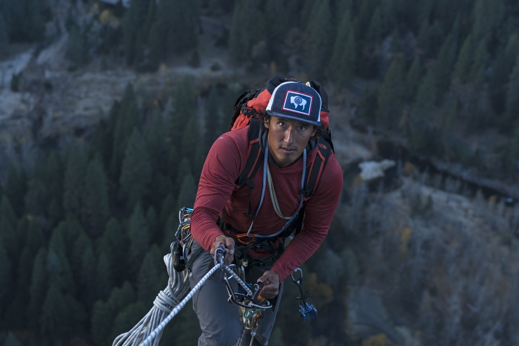 Jimmy Chin jumars up the wall of El Capitan, while wearing a backpack.