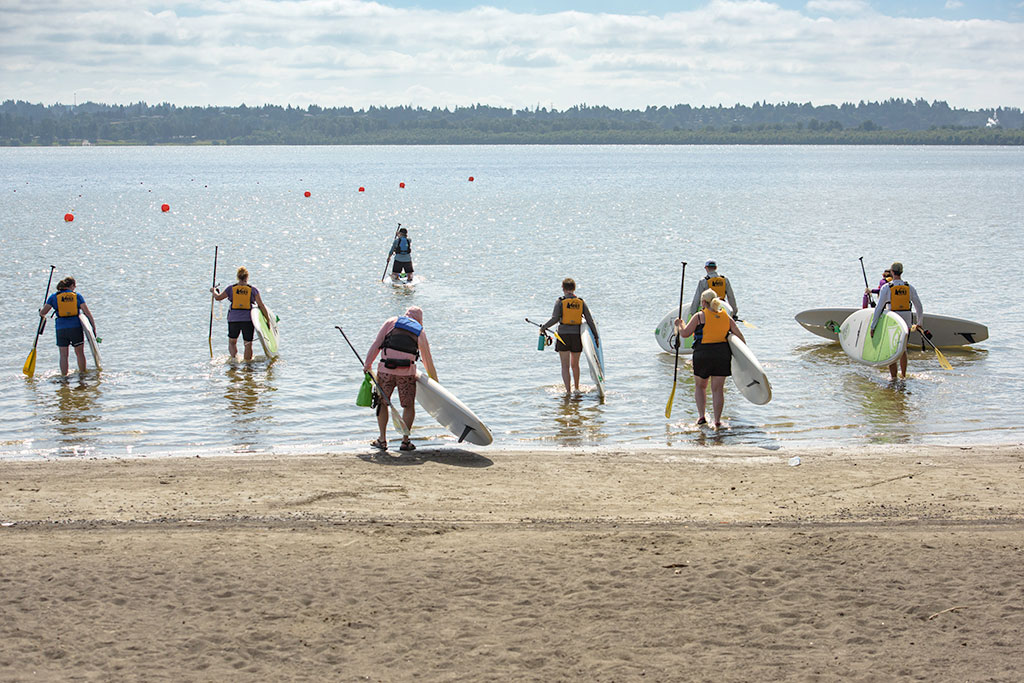 First Descent participants enter the lake