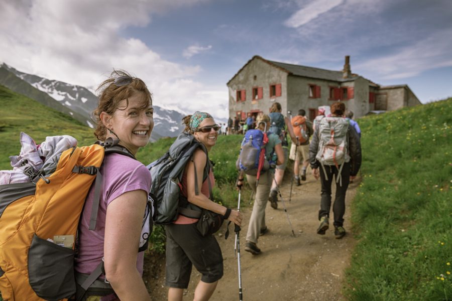 A group of hikers head for a hut after a long day on the TMB.