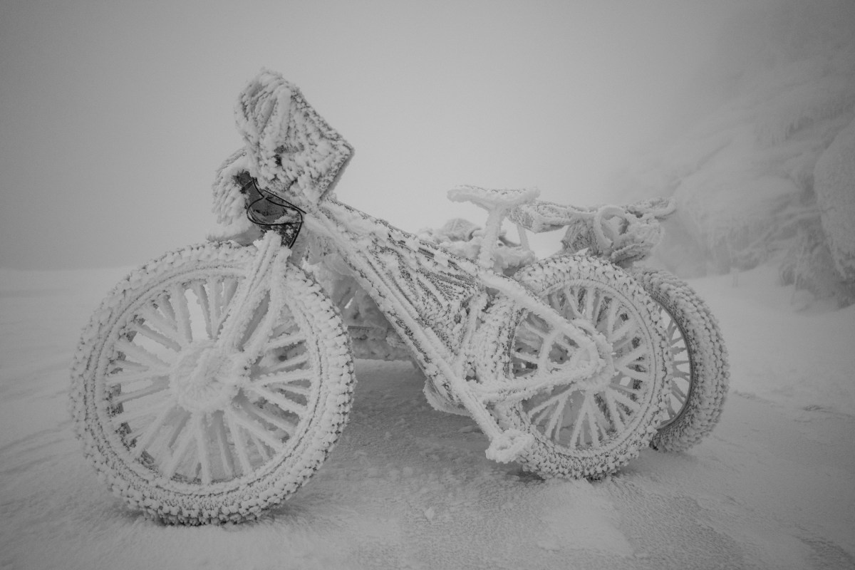 Four bikes frozen in rime. 