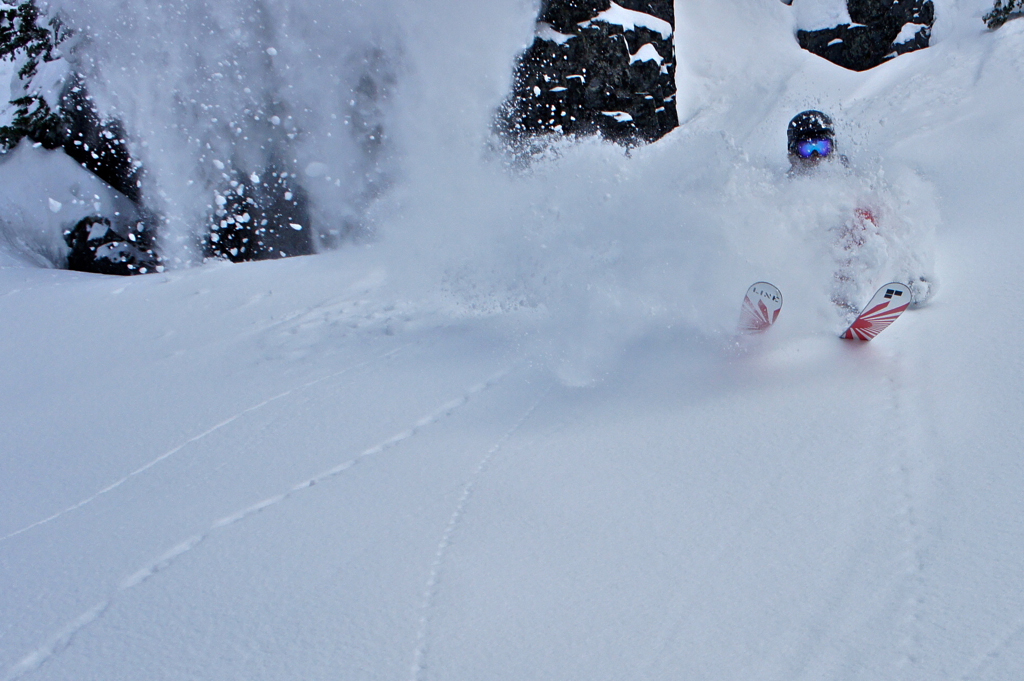 A skier reaps the powder rewards of the Whistler backcountry.