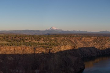 A wide shot of Central Oregon with a mountain peak in the distance