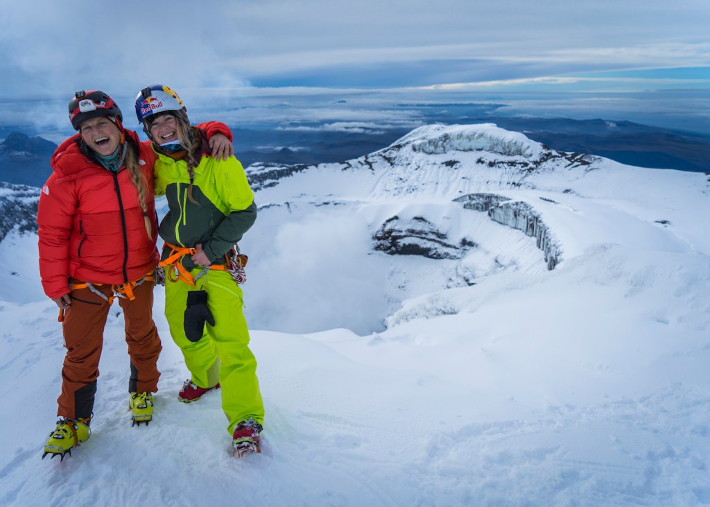 Emily Harrington and Michelle Parker stand on the summit of Cotopaxi in Ecuador.