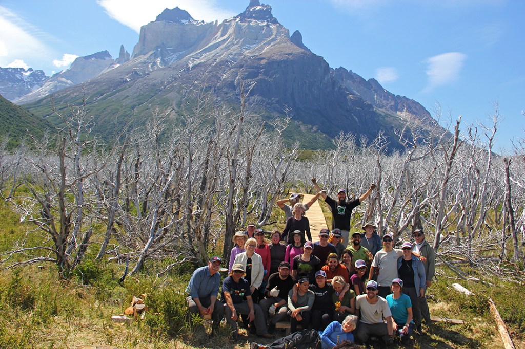 The volunteer trail workers pause from their labor to enjoy the sunshine.