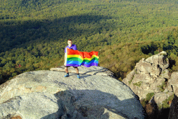 Mikah Meyer on top of Old Rag Mountain in Shenandoah National Park