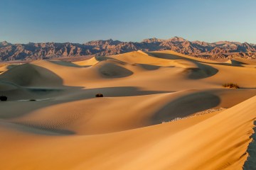 Sand Dunes and Funeral Mountains, Death Valley National Park, California.