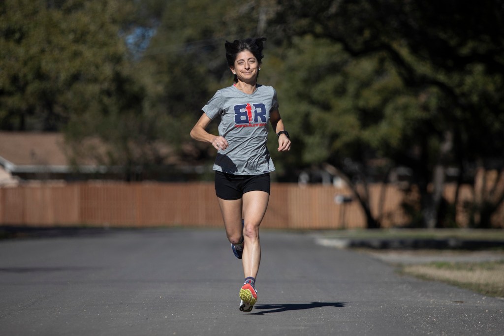 Liza Howard, who's 47, trains for her next run,