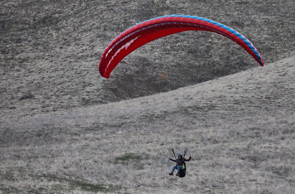 A paraglider comes in for a landing near Horseshoe Bend, Idaho.