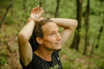 Grace Fisher, 38, training for an upcoming race, runs near her home in the town of Hancock, Maryland.