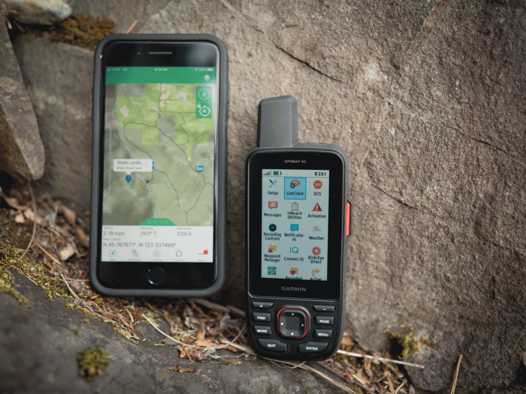 The Garmin GPSMAP 66i beside a smartphone for size comparison.