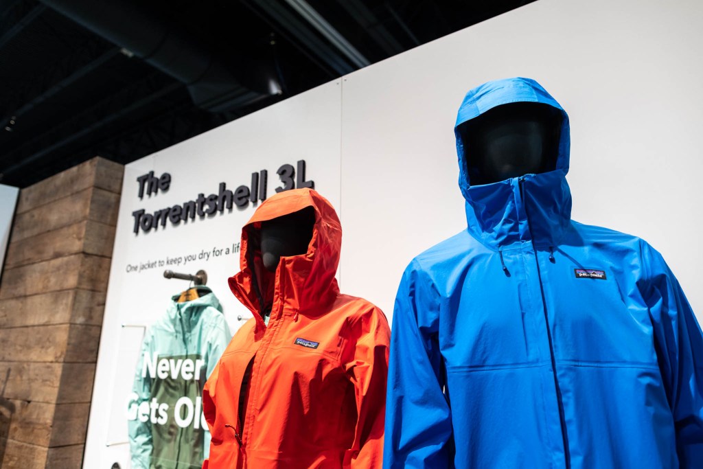 A red and blue Patagonia jacket hang on display at the Outdoor Retailer show.