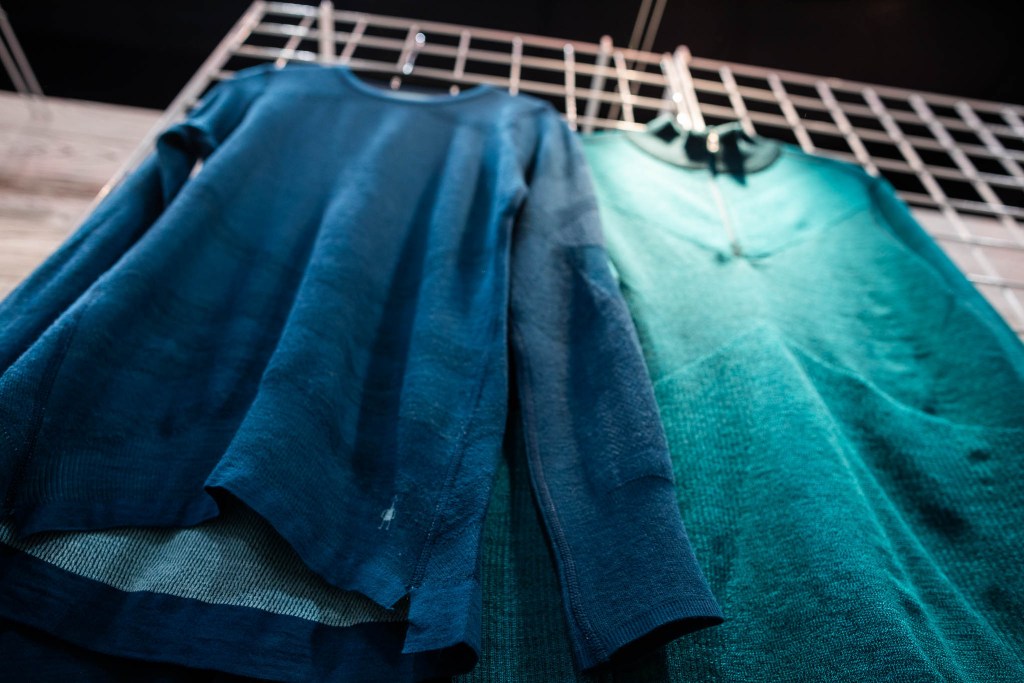 Two blue baselayers from Smartwool are made from a merino wool blend.