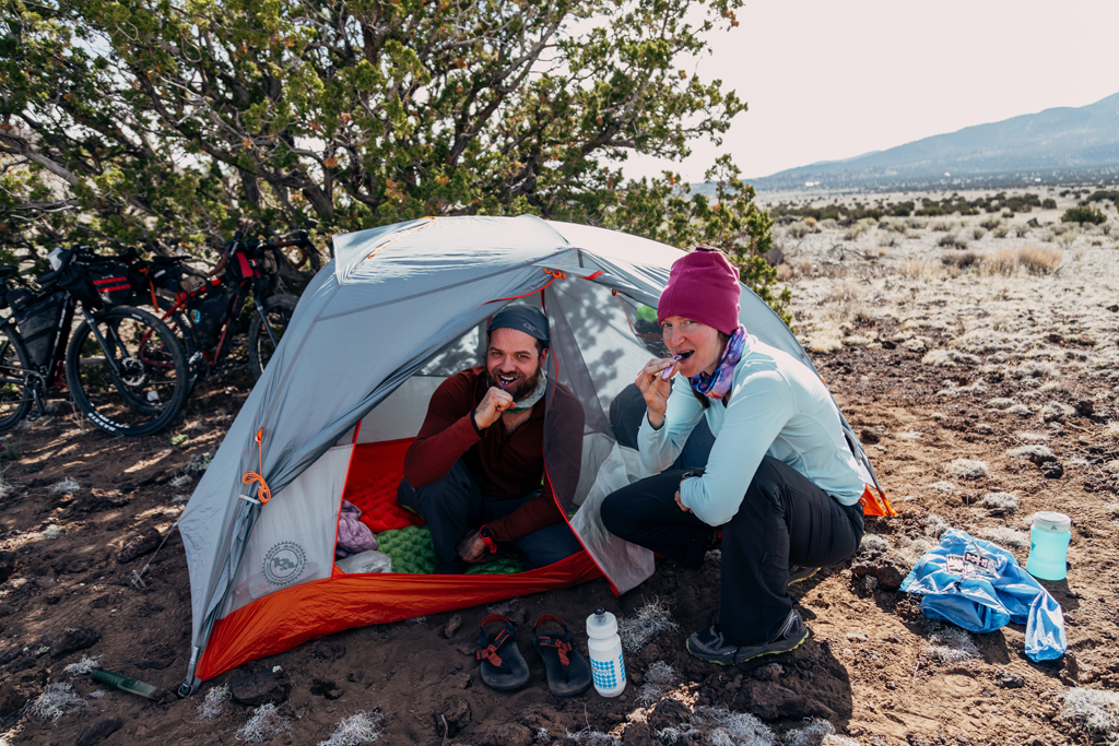 Amanda and Devon hang out at their campsite.