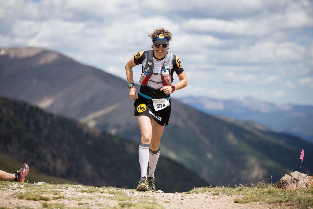 Leadville winner Emma Roca runs on a high-altitude peak.