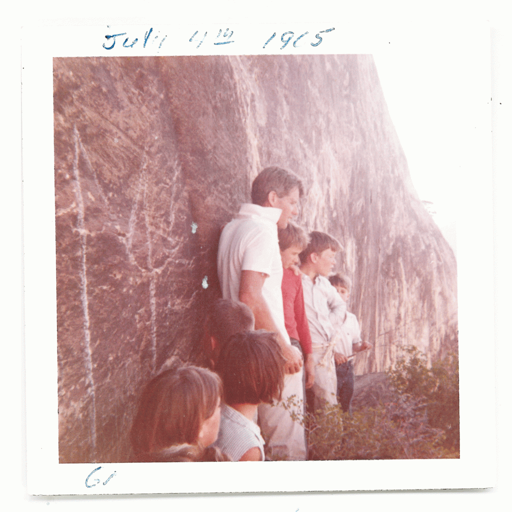 Robert Kennedy stands beside his young children during a whitewater rafting trip